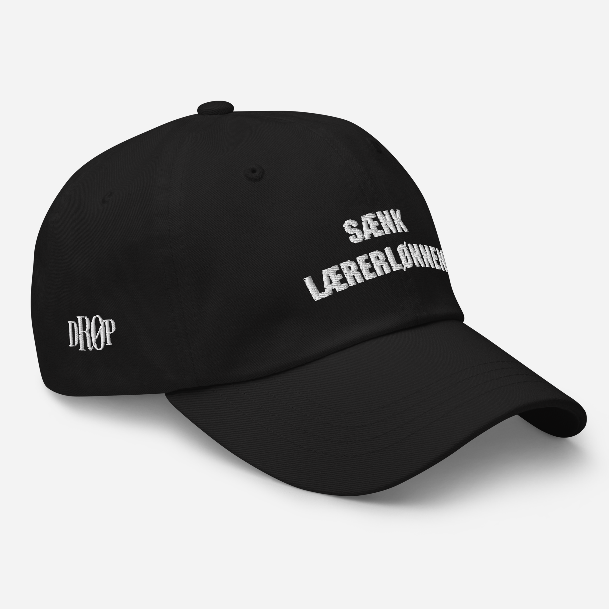 Sænk lærerlønnen Kasket